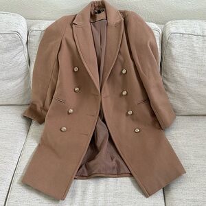 Brown coat with gold detailed buttons
